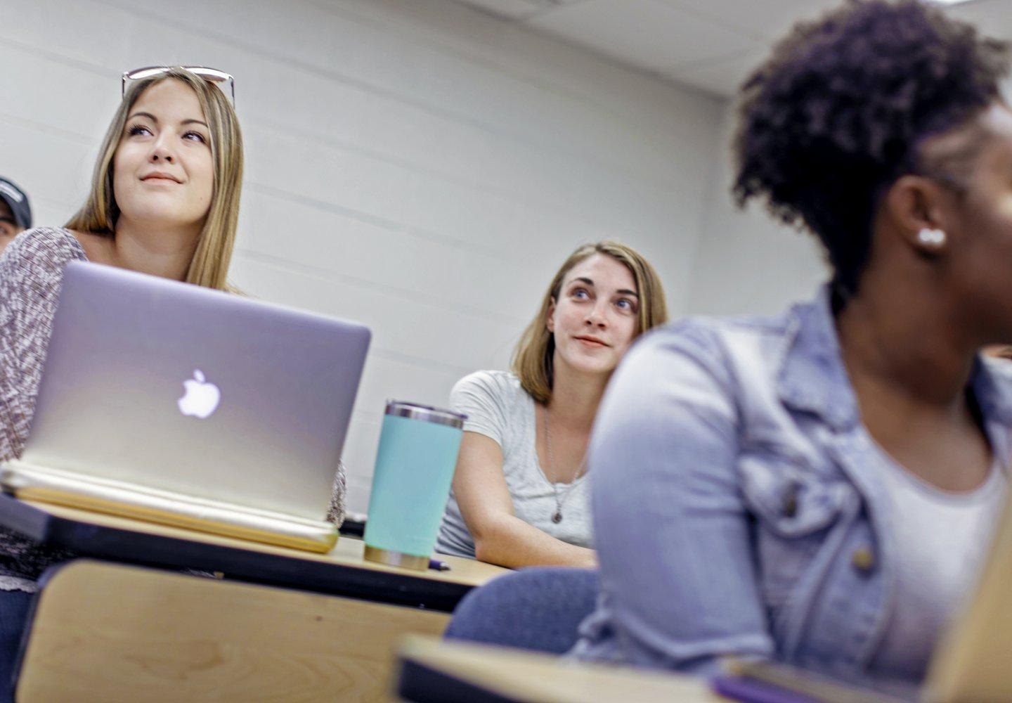 Students in classroom lecture.