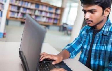 student on computer